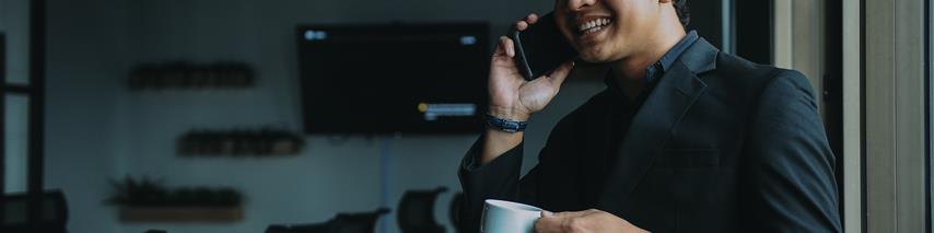 A business man speaking on a mobile phone