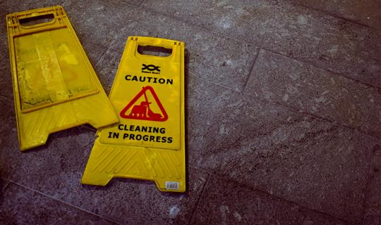 Caution wet floor signs on floor