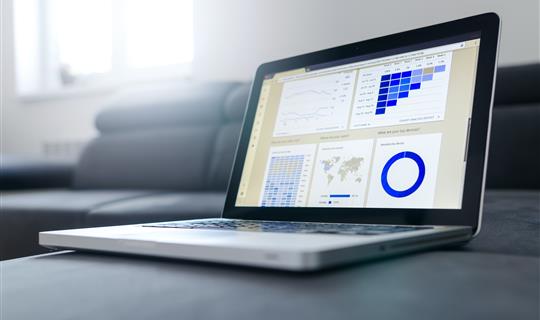 a laptop showing performance indicators