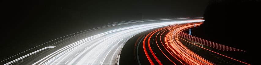 a UK motorway with blurred car lights